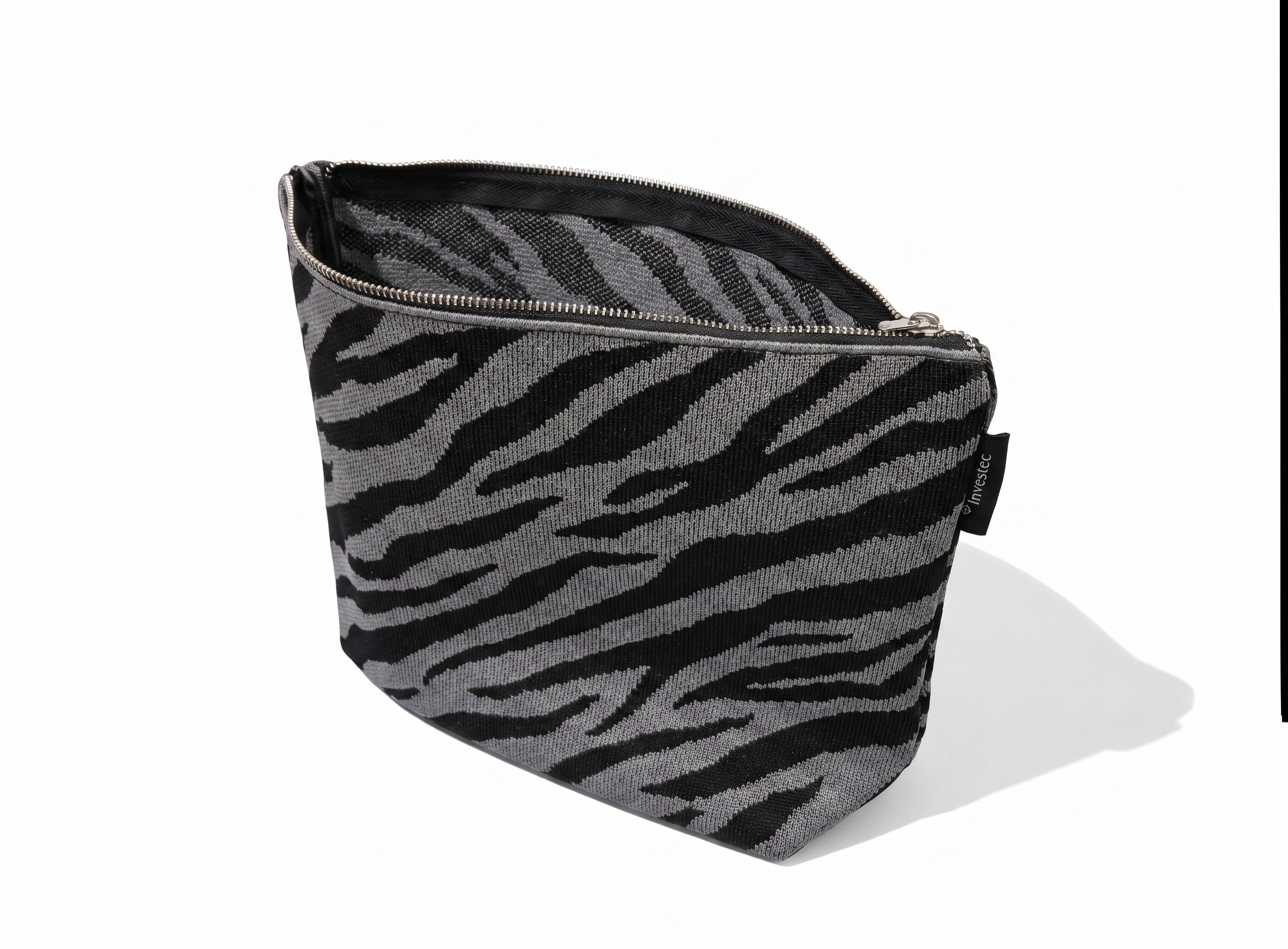 Woven zebra pouch